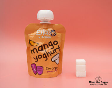 One pouch of Ellas kitchen mango yoghurt contains 10g of sugar, equivalent to 2.5 sugar cubes A photo of Ellas Kitchen mango yogurt pouch with 2.5 cubes of sugar.