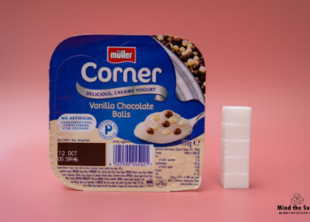One pack of Muller Corner Vanilla Chocolate Balls Yogurt contains 20.8g of sugar, equivalent to 5.2 sugar cubes A photo of Muller Corner Vanilla Chocolate Balls Yogurt with 5.2 cubes of sugar.
