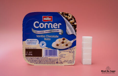 One pack of Muller Corner Vanilla Chocolate Balls Yogurt contains 20.8g of sugar, equivalent to 5.2 sugar cubes A photo of Muller Corner Vanilla Chocolate Balls Yogurt with 5.2 cubes of sugar.