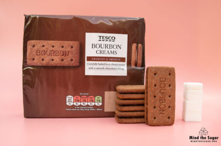 Four biscuits of Tesco Bourbon Creams contain 14.1g of sugar, equivalent to 3.5 sugar cubes A photo of Tesco Bourbon Creams biscuits with 3.5 cubes of sugar.