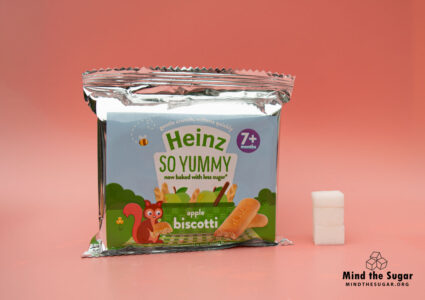 One pack of Heinz Apple Biscotti contains 9.5g of sugar, equivalent to 2.4 sugar cubes A photo of Heinz Apple Biscotti pack with 2.4 cubes of sugar.