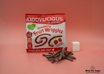 One pack of Kiddylicious Strawberry Fruit Wriggles contains 8.3g of sugar, equivalent to 2.1 sugar cubes A photo of Kiddylicious Strawberry Fruit Wriggles pack with 2.1 cubes of sugar.