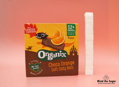Six bar of Organix Limited Edition Choco Orange Soft Oat Bar contain 48.6g of sugar, equivalent to 12.2 sugar cubes A photo of Organix Limited Edition Choco Orange Soft Oat Bar with 12 cubes of sugar.